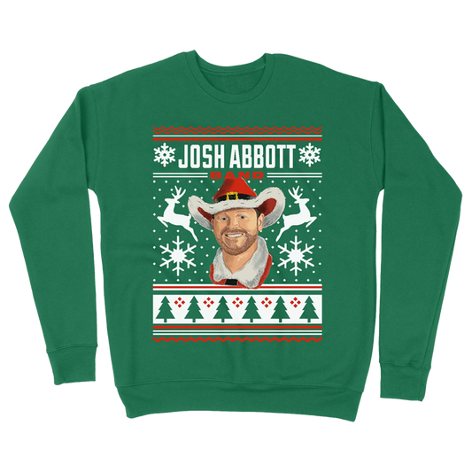 Green Christmas-themed sweatshirt featuring a cowboy design and the name ’Josh Abbott’.